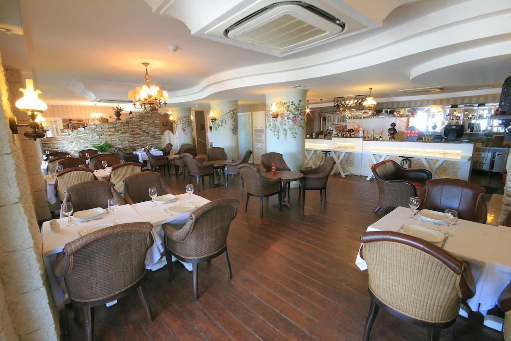 Trilyali Butik Hotel Tirilye Bagian luar foto